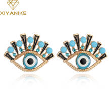 Xiyanike ouro cor azul mau olho parafuso prisioneiro brincos jóias indianas para as mulheres moda vintage acessórios por atacado frete grátis 2024 - compre barato