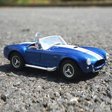 Welly-Coche de juguete de SHELBY COBRA, escala 1:24, 1965, vehículo de juguete, controlado por control remoto 2024 - compra barato