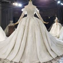 Luxury Ivory Long Sleeve Sparkle Wedding Dresses 2021 Dubai Off Shoulder Beading Pearls Bridal Gowns HX0206 Custom Made 2024 - buy cheap