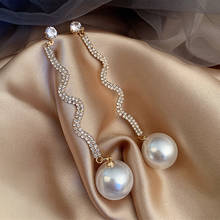 Длинные кисточки кристаллы свисающие серьги для женщин, глянцевый золотистый Серебристый Цвет S Форма стразы на крючках Жемчуг Серьги Свадебная вечеринка Jewelr 2024 - купить недорого
