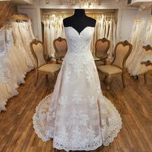 Кружевное свадебное платье-трапеция цвета шампанского, без бретелек 2024 - купить недорого