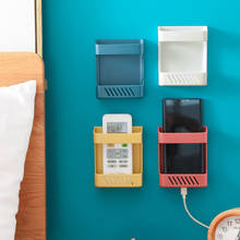 Caja de almacenamiento montada en la pared, soporte de enchufe para teléfono móvil, TV, aire acondicionado, Control remoto, mesita de noche, 2 uds. 2024 - compra barato
