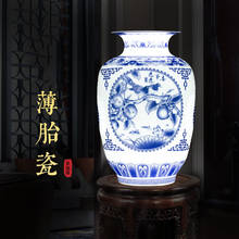 Jarrón de cerámica de Jingdezhen, perforado jarrón de porcelana azul y blanco, adornos modernos chinos para sala de estar, decoración de armario de TV 2024 - compra barato