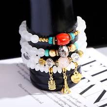 Модные браслеты с бусинами из белого камня, браслеты с подвесками, женский браслет в стиле бохо с совами и башней, женский браслет с подвеской 2024 - купить недорого