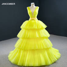 J67154 jancember amarelo vestidos de noite 2020 em camadas profundo sexy v-neck sem mangas faixas arco bola vestidos 2024 - compre barato