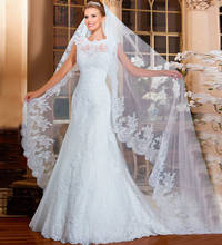 Скромное милое кружевное приталенное свадебное платье с юбкой-годе, свадебные платья на пуговицах 2024 - купить недорого