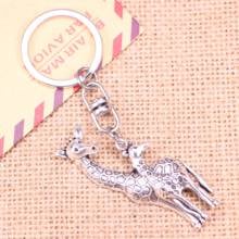 New Fashion Keychain 54x22mm giraffe deer Pendants DIY Men Jewelry Car Key Chain Ring Holder Souvenir For Gift 2024 - buy cheap