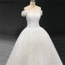 Белые блестящие свадебные платья без рукавов длиной до пола 2020 с блестками и бисером сексуальные свадебные платья HA2280 на заказ 2024 - купить недорого