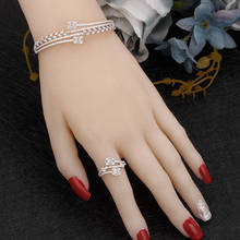 Conjunto de joyería de lujo para mujer, brazalete y anillo de Zirconia cúbica, ajustable, de alta calidad, para boda, 2 uds. 2024 - compra barato