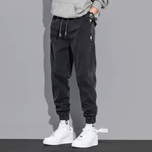 Japonês do vintage da forma dos homens calças de brim solto ajuste emendado designer harem calças de carga casual homme streetwear hip hop corredores 2024 - compre barato