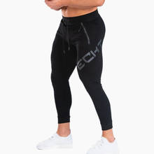 Новые мужские осенние спортивные штаны для бега, повседневные модные высококачественные узкие брюки с карманами на молнии, брюки для фитнеса бодибилдинга, Мужская Уличная одежда 2024 - купить недорого