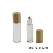 Botellas de bolas de acero Perfum para masaje, envase de bambú y cristal para brillo de labios, aceite/esencia, 10ML, venta al por mayor 2024 - compra barato
