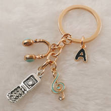 A-Z letter keychain phone headset keychain music note key ring gift men's women's jewelry accessories 2024 - buy cheap