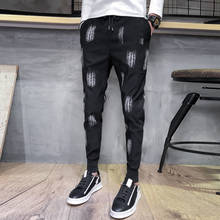 Новые осенние брюки на шнурке мужские эластичные тонкие модные повседневные штаны с принтом мужские уличные дикие хип-хоп джоггеры спортивные штаны 2024 - купить недорого
