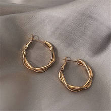 Серьги-кольца женские металлические, золотистые, медные, витые, геометрические 2024 - купить недорого
