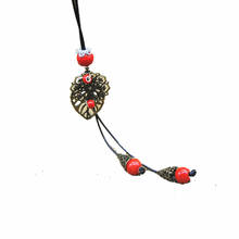 Ожерелье ручной работы с керамическим кулоном в виде листьев в этническом стиле N257 2024 - купить недорого