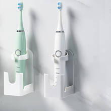 Estante de almacenamiento de cepillo de dientes montado en la pared para el hogar, soporte de carga autoadhesivo para baño, cepillo de dientes eléctrico, gancho de estante impermeable 2024 - compra barato