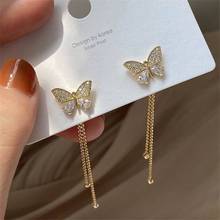 Pendientes largos con borlas para mujer, aretes con lazo frontal y trasero, con borla de cristal, temperamento largo, mariposa 2024 - compra barato