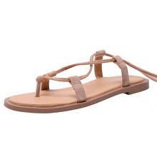 Sandalias planas con tiras cruzadas para mujer, zapatos de playa de viento de hada romana, calzado salvaje de estudiante, novedad de verano 2019 2024 - compra barato