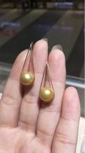 Precioso par de pendientes de perlas doradas redondas del Mar del Sur de 10-11mm, 18k 2024 - compra barato