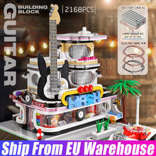 Yeshin-16002 Streetview modelo MOC Guitar Shop con juego de luces Led, bloques de construcción, Juguetes Divertidos para niños, regalos de navidad 2024 - compra barato