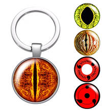 Llavero redondo con forma de ojo de pupila para hombre y mujer, accesorio para llaves de coche, de cristal, color plateado 2024 - compra barato