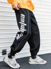 Pantalones reflectantes con bolsillos para hombre, pantalón negro de Hip Hop, con cordón, novedad de Otoño de 2020 2024 - compra barato