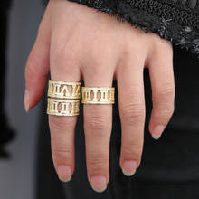 Nuevo modelo bling cz cubic zirconia diseño de números romanos amplio cz engagment band ring color dorado para hombres y mujeres 2024 - compra barato