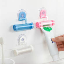 Exprimidor de pasta de dientes para habitación, tubo dispensador creativo de pasta de dientes, colgador con ventosa, accesorios de baño, 5 colores 2024 - compra barato