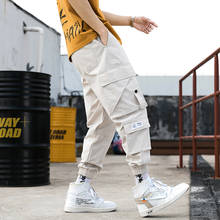 Pantalones Cargo de estilo Hip Hop para hombre, ropa de calle con cintas y múltiples bolsillos, estilo Harem, novedad de 2020 2024 - compra barato