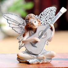 Instrumento Musical de resina europea para niña, decoración de Ángel, arte para habitación de niños, violonchelo, guitarra, flor, figuritas de hadas, adornos artesanales 2024 - compra barato