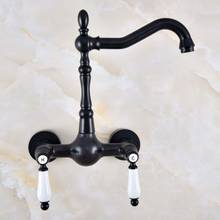 Negro aceite frotado bronce baño cocina lavabo grifo mezclador grifo caño giratorio montado en la pared de dos asas mnf856 2024 - compra barato