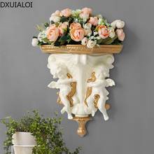Decoración de habitación Europea artículos de artesanía antigua flores familia pared Ángel colgante florero decoración de flores 2024 - compra barato