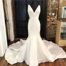 Свадебное платье с длинным шлейфом, без рукавов, с глубоким v-образным вырезом, цвета слоновой кости 2024 - купить недорого