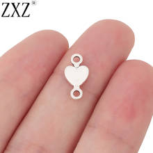 ZXZ-colgantes de plata tibetana con forma de corazón, abalorios de 2 caras para pulsera, joyería, 14x7mm, 50 Uds. 2024 - compra barato