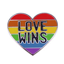 No matter what, love conquers all. Show your pride with this heart-shaped pin brooch featuring rainbow stripes & Love Wins text! 2024 - buy cheap