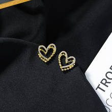 Zeojrlly металлические женские модные серьги-гвоздики в форме сердца простые маленькие женские корейские серьги новые модные элегантные ювелирные изделия 2024 - купить недорого