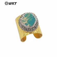 WT-RR011 Wholesale Custom CZ Paved Natural Round Ocean J asper Stone Cigar Ring With Gold Electroplated Adjustbale Size Rings 2024 - buy cheap