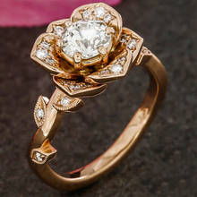Mostyle 2018 Новое дизайнерское Золотое кольцо с камнем CZ и розовым цветком для женщин 2024 - купить недорого