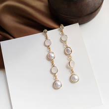 Pendientes de estilo coreano para mujer, aretes suaves y dulces con perlas de cristal de imitación, temperamento Simple, borla larga 2024 - compra barato