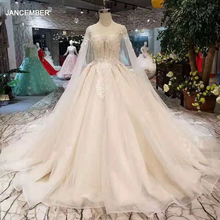 LSS284 luz vestidos de novia color champán con Cabo ilusión cuello de encaje bola vestido платье с открытой спиной 2024 - compra barato