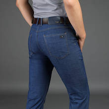 Мужские классические прямые джинсы, черные хлопковые эластичные прямые брюки в стиле смарт-кэжуал, осень 2021 2024 - купить недорого
