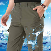 Брюки-карго мужские зимние на флисе, водонепроницаемые, с несколькими карманами, 4XL 2024 - купить недорого