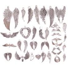 Charms variados de ala de Ángel para mujer, amuletos de plumas pequeñas de Color plateado antiguo, accesorios de joyería DIY, amuletos de pájaro de ala, venta al por mayor 2024 - compra barato