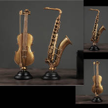 Modelo de saxofón de violín Vintage nórdico de lujo, adornos, instrumento Musical, estatua, decoración del hogar, escultura para sala de estar, artesanías de arte 2024 - compra barato