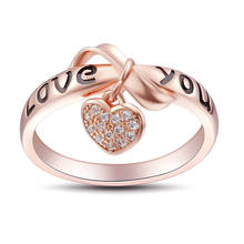 Кольцо обручальное, розовое золото, с подвеской в форме сердца 2024 - купить недорого