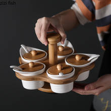 Tarro giratorio de cerámica con 5 rejillas para especias, recipiente creativo con cucharas, para sal y pimienta, utensilios de cocina 2024 - compra barato
