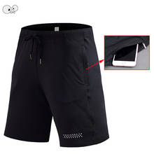 Secagem rápida de fitness respirável correndo shorts com bolso dos homens esporte ginásio shorts roupas esportivas dos homens jogging calças curtas legging 2024 - compre barato