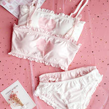 Conjunto de ropa interior Sexy japonesa para mujer, lencería ultrafina, bragas sujetador y con dibujos animados, sujetador blanco y rosa sin aros, Tanga con volantes, 2 uds. 2024 - compra barato