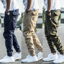 Модные мужские джинсы в японском стиле, Дизайнерские повседневные брюки-карго, уличная одежда, Джоггеры в стиле хип-хоп, мужские комбинезоны, брюки-султанки с завязками на щиколотке 2024 - купить недорого